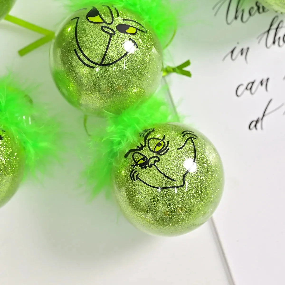 12pcs Grinch Cat Face Christmas Ball Ornaments: 6cm Green Carnival Fruit Pendant Tree Decorations for Holiday Festivities